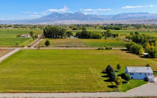 Colorado Country Home with Irrigated Hayfield Mountain Views