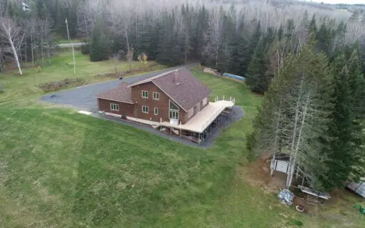Contemporary Log Home on Trout Pond