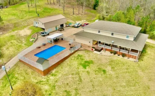 Five Bedroom, Pool Home on the Edge Of Town with 9+ Acres.