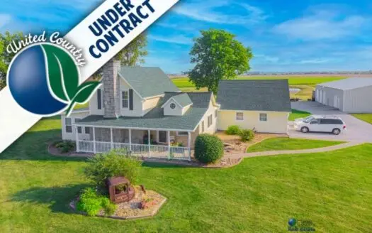 Restored Farmhouse on 9.5 Acres with Outbuildings in Butler
