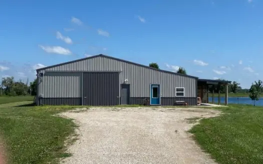 Country Home on 15 +/- Acres with Pond Minutes from Town!