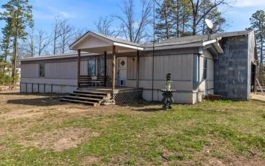 Country Retreat with Abundant Storage and Versatile Outbuildings