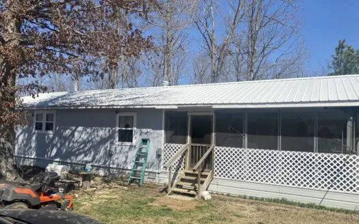 Country Home with Acreage with Spring