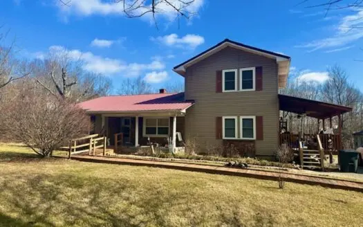 Versatile Home & Business Opportunity on 2 Acres.