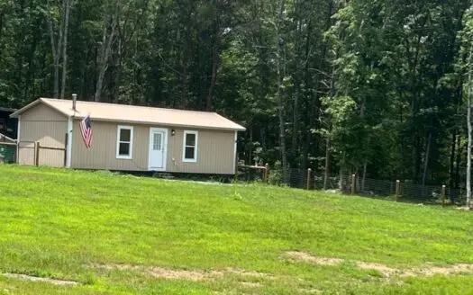 Rustic Retreat on 5.02 Acres in great location.