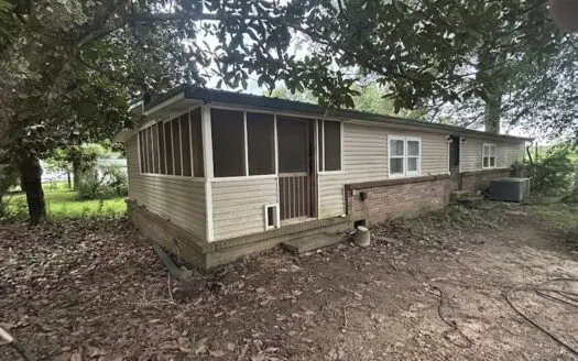 9.8 Acres with Renovated Mobile Home, Pond, & Camper Setup