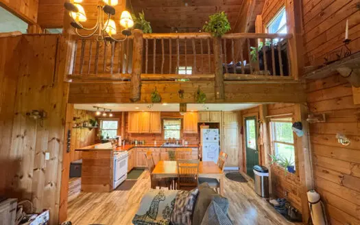 Off-Grid Log Home on 33.4 Acres