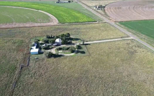 Charming Farmhouse and Land for Sale in Portales, NM