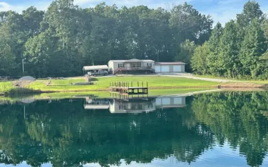 Country home on 3.5 acres with a 1-acre pond.