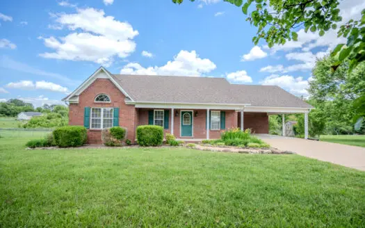 Charming Brick Home with Sunroom & Spacious Yard!