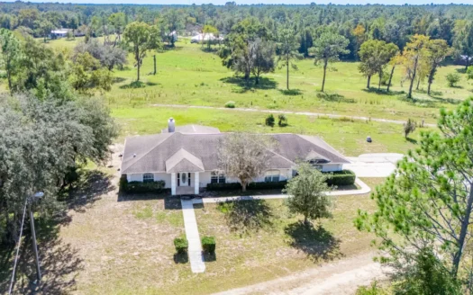 Home with a backyard golf course view