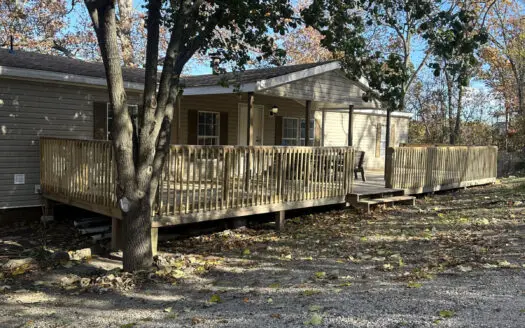 Country Home sits on 9 plus acres wooded