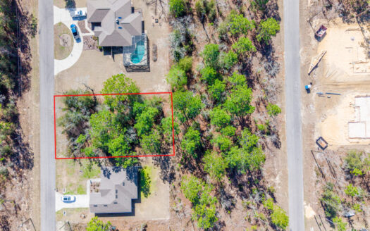 PAVED ROAD LOT in Williston Highlands