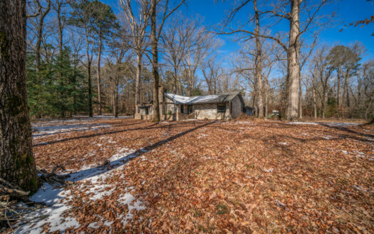 Brick home with 11 acres & workshop