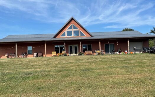 Stunning Missouri Home with Acreage & Private Lake Retreat