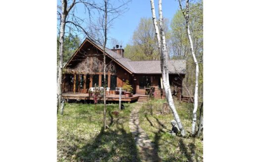 80 Wooded Acres with Chalet Home in Finlayson