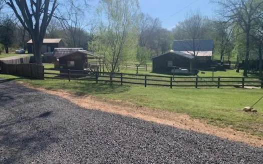 Home With Apartment Loft And Several Outbuildings