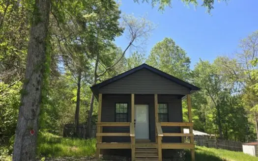 Affordable lake-area retreat with income potential