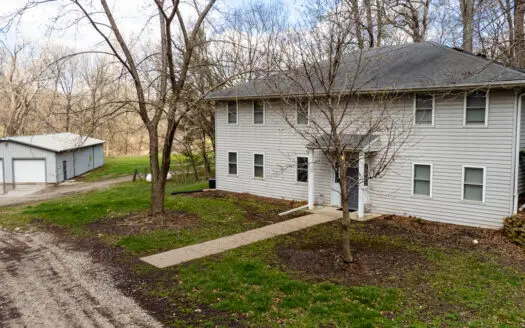 12± Acres with Creek, Shop & Spacious Home Near Cameron