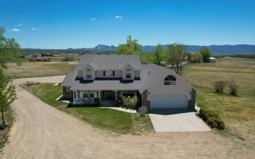 Beautiful 4BR Country Home with Irrigated Acreage & Scenic Views