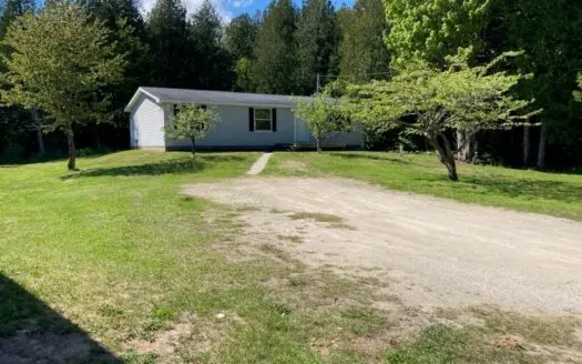 TOTALLY REMODELED HOME just west of De Tour Village
