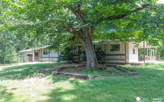 7 wooded acres with a pond and year around creek