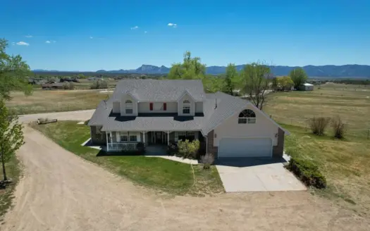 Beautiful 4BR Country Home with Irrigated Acreage & Scenic Views