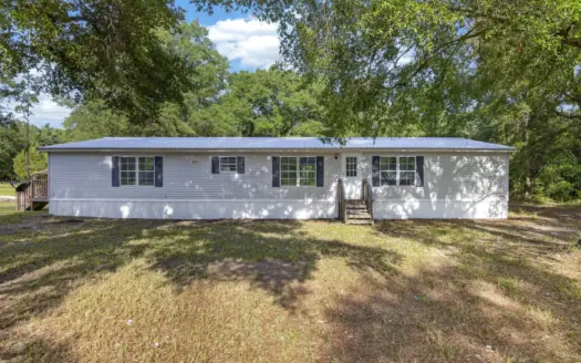 Welcome to your own private retreat nestled on 10 beautiful acres