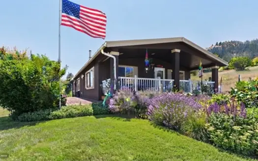Home with large greenhouse on 20 Acres near the Salmon River