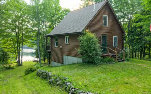 Maine Log Cabin Along the Carrabassett River