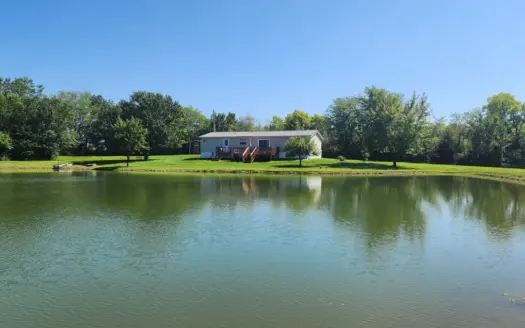 7.7 Picturesque Acres, 1.5 Acre Pond, & Charming Home!
