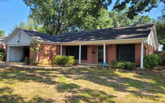 Updated 1965 Historic Brick Home with Large Backyard in Paris, TX