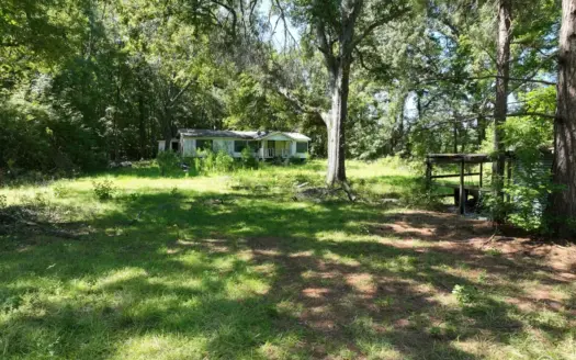 17± Acres of East Texas Woods with Double Wide Fixer-Upper