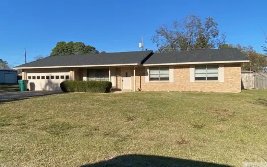 Move-In Ready 3 Bed Brick Home with Insulated Shop & Fireplace