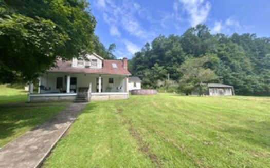 Nearly 100 Acre Farm with Home, Barn, Garage, Timber & Potential