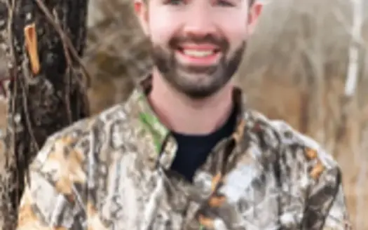 agent profile picture for Coltyn Bettis on country homes website