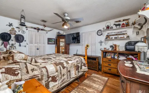 In-Town Acreage with Shop & Dual Access