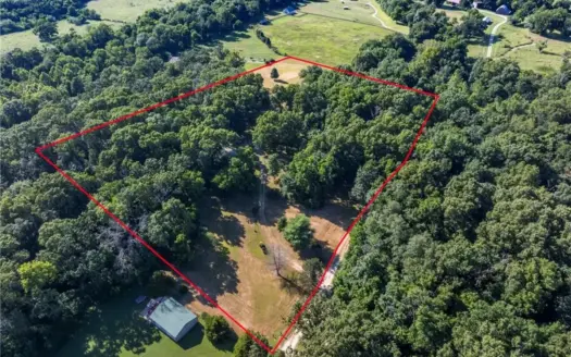 Land and Home for Sale in Gravette, Arkansas