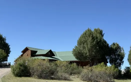 spacious home on 10.15 acres with meadows and a large garage