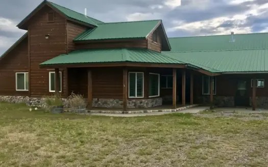 spacious home on 10.15 acres with meadows and a large garage