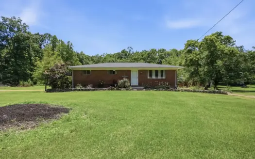 Stunning 4-BR Brick Home on 5.49 Acres with Barn & Creek