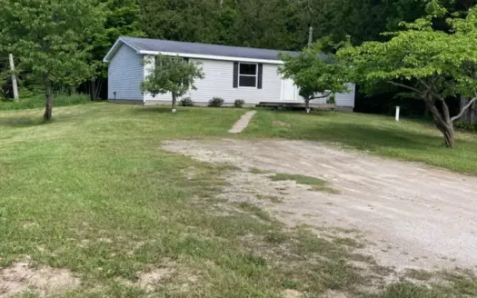 TOTALLY REMODELED HOME just west of De Tour Village