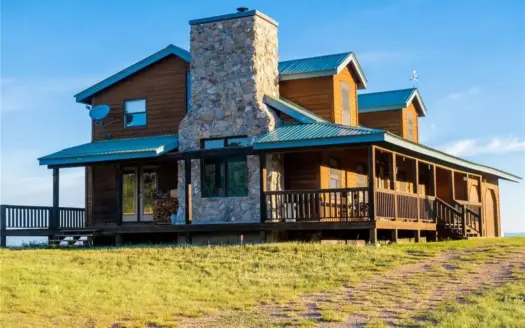 John Wayne-Inspired Western Ranch Home with Mountain Views