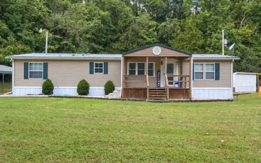 Creekside Living on 3.98 Acres with Spacious 3-Bedroom Home