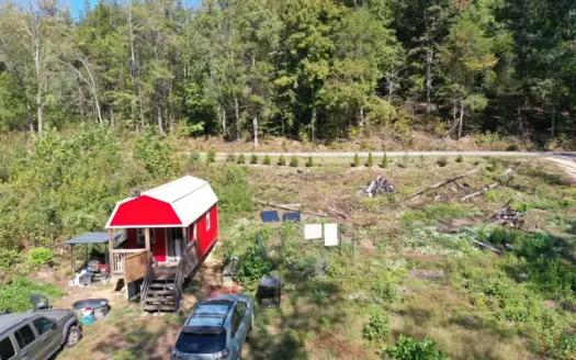 6.23 acres with Creek and 10X18 Off Grid Cabin For Sale!