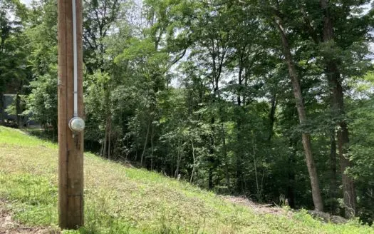 Prime 0.56-Acre Lot Near Lake & Golf – Invest or Build