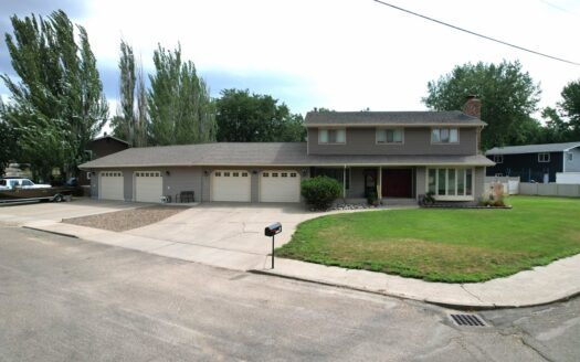 6 bedroom 3/ 1/2 bath house with attached 4 stall garage