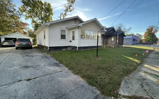 Charming 2-Bed Home with Extra Lot and 4-Season Porch in Robinson