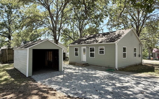 Updated Efficient Bungalow with Basement & Garage in MO