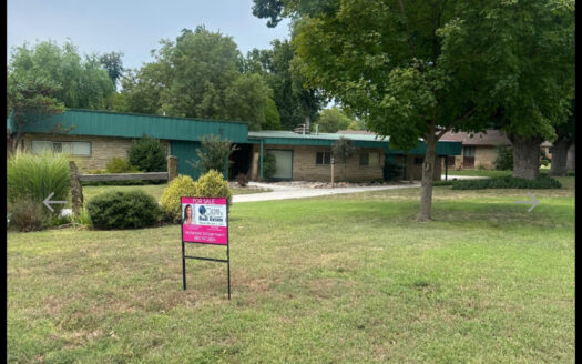 Uniquely crafted residential home on corner lot